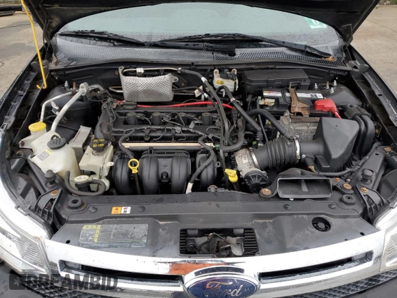 2008 Ford Focus SE with VIN 1FAHP33N28W195802, listed as a Copart auction lot 51786175 with 140,516 mi miles and Salvage Title. Bid and sale history available at carsss.com. Image 11.