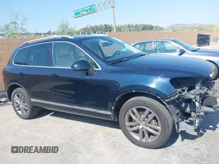 2016 Volkswagen Touareg Sport with VIN WVGEF9BP7GD010252, listed as a IAAI auction lot 42465165 with Not provided miles and . Bid and sale history available at DreamBid. Image 14.