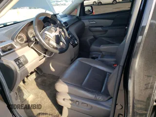 2013 Honda Odyssey EX-L with VIN 5FNRL5H66DB023651, listed as a Copart auction lot 48676274 with 164,687 mi miles and Salvage Title. Bid and sale history available at DreamBid. Image 7.
