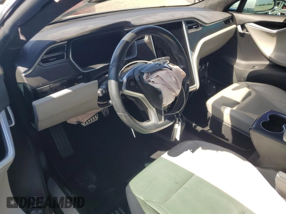 2016 Tesla Model S 90D z VIN 5YJSA1E4XGF115997, wystawiony jako Copart lot #60933525 z przebiegiem Nie podano mil oraz Szkoda całkowita • Salvage title. Historia ofert i sprzedaży dostępna na DreamBid. Obrazek 8.