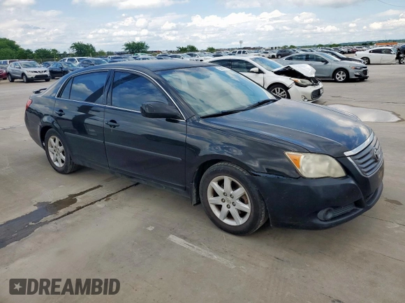 2010 Toyota Avalon XL with VIN 4T1BK3DB2AU360201, listed as a Copart auction lot 54443575 with 220,759 mi miles and Clean Title. Bid and sale history available at carsss.com. Image 4.