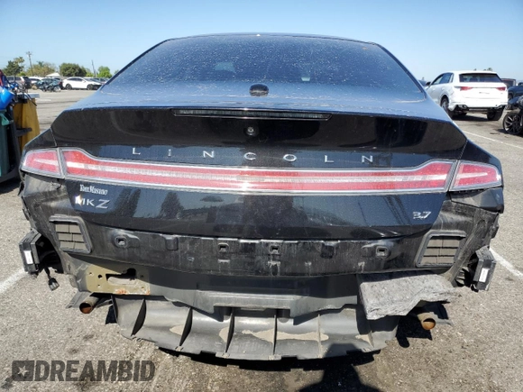 2014 Lincoln MKZ z VIN 3LN6L2GK0ER800286, wystawiony jako Copart lot #57644645 z przebiegiem 130 880 mil mil oraz Szkoda całkowita • Salvage title. Historia ofert i sprzedaży dostępna na DreamBid. Obrazek 6.
