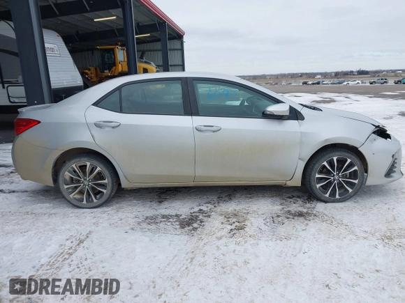 2019 Toyota Corolla L z VIN 5YFBURHE7KP928799, wystawiony jako IAAI lot #41232273 z przebiegiem 130 733 mil mil oraz . Historia ofert i sprzedaży dostępna na DreamBid. Obrazek 13.
