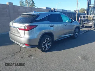 2022 Lexus RX 450h с VIN 2T2HGMDA0NC074486, выставлен на аукционе IAAI как лот 41434677 с пробегом 50 955 миль миль и . История ставок и продаж доступна на DreamBid. Изображение 4.
