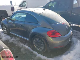 2012 Volkswagen Beetle 2.5L PZEV with VIN 3VWJP7AT0CM630116, listed as a IAAI auction lot 41401663 with 150,674 mi miles. Bid and sale history available at carsss.com. Image 3.