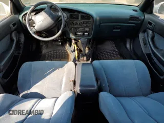 1992 Toyota Camry z VIN 4T1VK12E0NU015172, wystawiony jako Copart lot #58974095 z przebiegiem 210 163 mil mil oraz Szkoda całkowita • Salvage title. Historia ofert i sprzedaży dostępna na DreamBid. Obrazek 8.