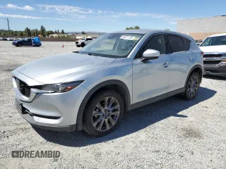 2019 Mazda CX-5 Grand Touring with VIN JM3KFADM0K0546110, listed as a Copart auction lot 66231135 with 140,400 mi miles and Clean title. Bid and sale history available at DreamBid. Image 1.