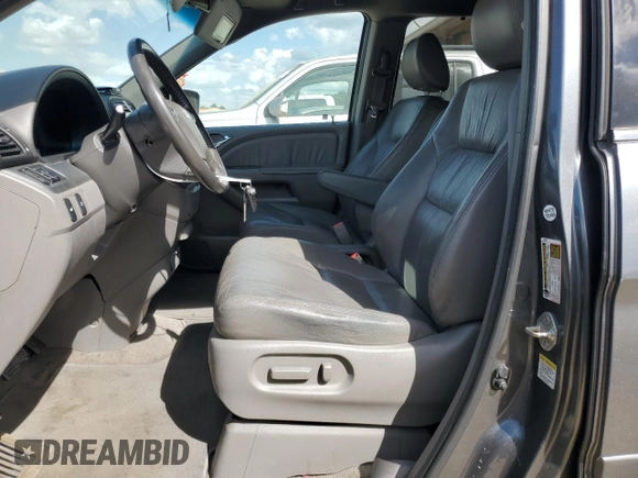 2010 Honda Odyssey EX-L with VIN 5FNRL3H65AB071013, listed as a Copart auction lot 51932435 with 234,318 mi miles and Clean Title. Bid and sale history available at carsss.com. Image 7.