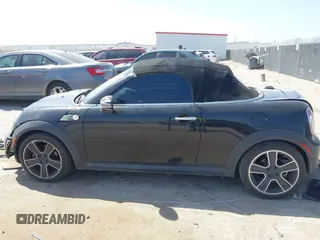 2012 MINI Roadster S with VIN WMWSY3C56CT144520, listed as a IAAI auction lot 41818205 with 86,836 mi miles and . Bid and sale history available at DreamBid. Image 14.