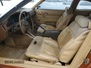 1982 Datsun 280ZX 2+2 z VIN JN1HZ06S8CX435431, wystawiony jako Copart lot #44468595 z przebiegiem 41 956 mil mil oraz Tytuł czysty. Historia ofert i sprzedaży dostępna na DreamBid. Obrazek 7.