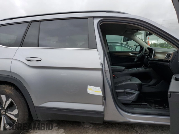 2024 Volkswagen Atlas SE с VIN 1V2DR2CAXRC555619, выставлен на аукционе Copart как лот 75097554 с пробегом Не указан миль и Списание • Salvage title. История ставок и продаж доступна на DreamBid. Изображение 13.