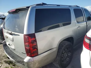 2010 Chevrolet Suburban LT with VIN 1GNUCJE08AR133956, listed as a Copart auction lot 76145714 with 212,459 mi miles and Salvage Title. Bid and sale history available at carsss.com. Image 3.