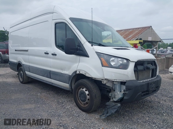 2024 Ford Transit Cargo z VIN 1FTBR3X89RKA14329, wystawiony jako IAAI lot #42483348 z przebiegiem 85 692 mil mil oraz . Historia ofert i sprzedaży dostępna na DreamBid. Obrazek 1.