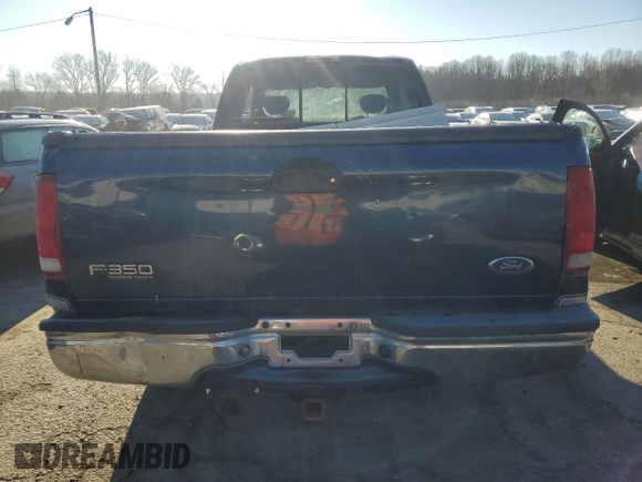 2001 Ford F-350 XL with VIN 1FTSX31F41EC49298, listed as a Copart auction lot 41764345 with 502,614 mi miles and Salvage Title. Bid and sale history available at DreamBid. Image 6.