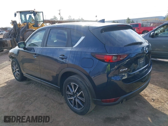 2018 Mazda CX-5 Touring z VIN JM3KFACM0J1389057, wystawiony jako IAAI lot #40922679 z przebiegiem 140 026 mil mil oraz . Historia ofert i sprzedaży dostępna na DreamBid. Obrazek 3.
