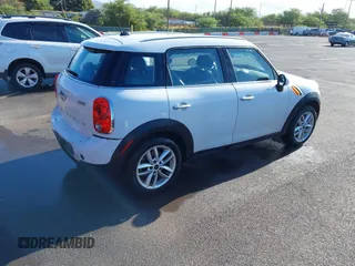 2013 MINI Countryman with VIN WMWZB3C52DWR35806, listed as a IAAI auction lot 42184010 with 93,380 mi miles and . Bid and sale history available at DreamBid. Image 4.
