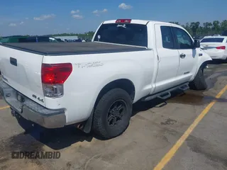 2012 Toyota Tundra z VIN 5TFUW5F10CX265543, wystawiony jako IAAI lot #42162418 z przebiegiem 219 270 mil mil oraz . Historia ofert i sprzedaży dostępna na DreamBid. Obrazek 4.