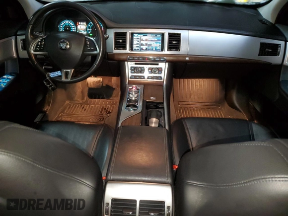 2015 Jaguar XF with VIN SAJXJ0EF1F8U48283, listed as a Copart auction lot 81004054 with 77,828 mi miles and Clean Title. Bid and sale history available at DreamBid. Image 8.