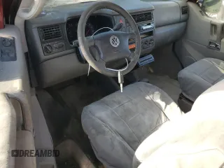 2003 Volkswagen EuroVan MV с VIN WV2NB47013H001081, выставлен на аукционе Copart как лот 82126354 с пробегом 158 433 миль миль и Чистый • Clean title. История ставок и продаж доступна на DreamBid. Изображение 8.