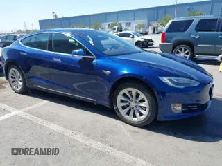 2016 Tesla Model S 90D with VIN 5YJSA1E25GF157220, listed as a IAAI auction lot 42003019 with 130,540 mi miles and . Bid and sale history available at DreamBid. Image 1.