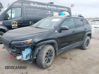 2019 Jeep Cherokee Trailhawk with VIN 1C4PJMBX6KD232515, listed as a IAAI auction lot 39495367 with 53,293 mi miles and . Bid and sale history available at DreamBid. Image 2.