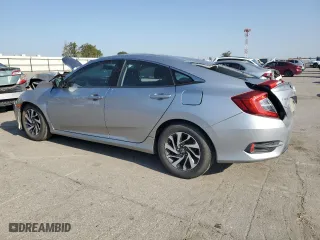 2016 Honda Civic Sedan EX with VIN 19XFC2F75GE232841, listed as a Copart auction lot 52128065 with 55,560 mi miles and Salvage Title. Bid and sale history available at carsss.com. Image 2.