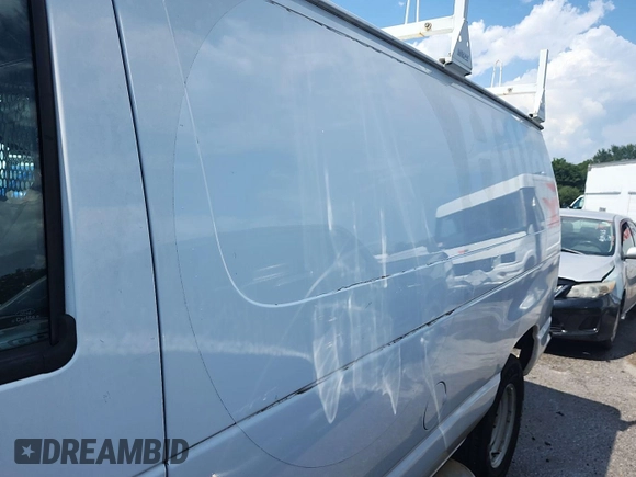 2014 Ford Econoline Cargo Commercial with VIN 1FTNE2EW0EDA53278, listed as a IAAI auction lot 42854412 with 188,803 mi miles and . Bid and sale history available at DreamBid. Image 24.