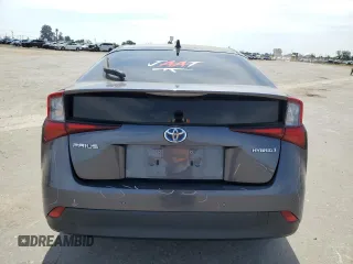 2020 Toyota Prius L Eco z VIN JTDKARFU9L3105675, wystawiony jako Copart lot #54587165 z przebiegiem 130 560 mil mil oraz Szkoda całkowita • Salvage title. Historia ofert i sprzedaży dostępna na DreamBid. Obrazek 6.