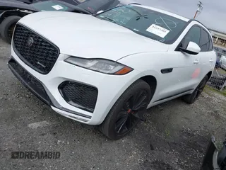 2023 Jaguar F-Pace R-Dynamic S with VIN SADCT2FUXPA711966, listed as a IAAI auction lot 41197305 with 18,871 mi miles and . Bid and sale history available at DreamBid. Image 2.