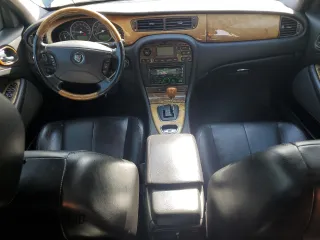 2005 Jaguar S-Type with VIN SAJWA01T15FN13800, listed as a Copart auction lot 53576305 with 182,533 mi miles and Salvage Title. Bid and sale history available at DreamBid. Image 8.
