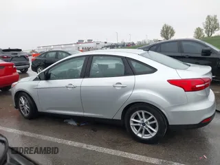 2017 Ford Focus SE with VIN 1FADP3F24HL303600, listed as a IAAI auction lot 41948159 with 95,212 mi miles and . Bid and sale history available at DreamBid. Image 15.