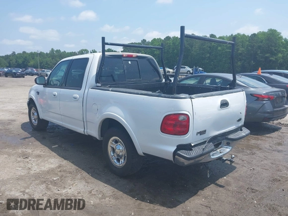 2001 Ford F-150 XLT with VIN 1FTRW07L91KB77612, listed as a IAAI auction lot 42432387 with 106,574 mi miles and . Bid and sale history available at DreamBid. Image 3.
