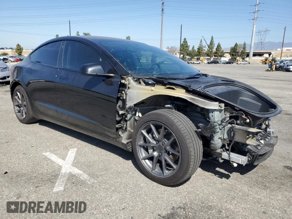 2023 Tesla Model 3 with VIN 5YJ3E1EA4PF562792, listed as a Copart auction lot 55994165 with 17,234 mi miles and Salvage title. Bid and sale history available at DreamBid. Image 4.