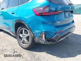 2023 BMW X1 xDrive28i with VIN WBX73EF00P5W52935, listed as a IAAI auction lot 42221084 with 16,394 mi miles and . Bid and sale history available at DreamBid. Image 6.