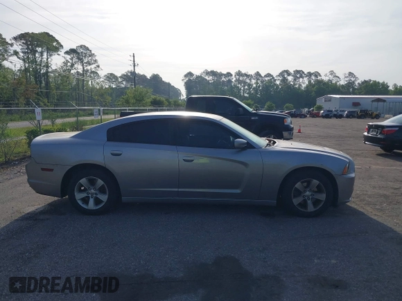 2014 Dodge Charger SE with VIN 2C3CDXBGXEH284832, listed as a IAAI auction lot 42069294 with 186,273 mi miles and . Bid and sale history available at carsss.com. Image 13.