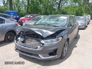 2020 Ford Fusion Titanium with VIN 3FA6P0RUXLR182120, listed as a IAAI auction lot 42351542 with 141,746 mi miles and . Bid and sale history available at DreamBid. Image 17.