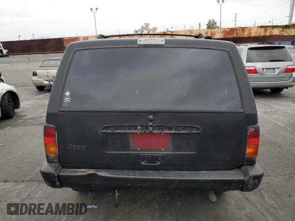 1998 Jeep Cherokee SE with VIN 1J4FT28S1WL203077, listed as a Copart auction lot 75872944 with 184,840 mi miles and Salvage Title. Bid and sale history available at carsss.com. Image 6.