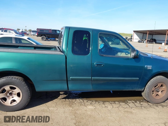 1999 Ford F-150 XL with VIN 1FTRX17L3XNC30010, listed as a IAAI auction lot 41632812 with 268,884 mi miles. Bid and sale history available at carsss.com. Image 13.