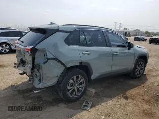 2022 Toyota RAV4 Hybrid XLE Premium with VIN 4T3B6RFV8NU101319, listed as a Copart auction lot 60987535 with 100,070 mi miles and Salvage title. Bid and sale history available at DreamBid. Image 3.