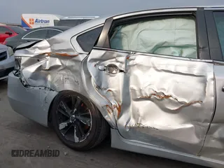 2015 Nissan Altima SL z VIN 1N4AL3APXFC480070, wystawiony jako IAAI lot #42281524 z przebiegiem 106 963 mil mil oraz . Historia ofert i sprzedaży dostępna na DreamBid. Obrazek 6.