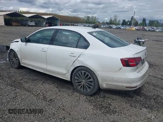 2016 Volkswagen Jetta Sport z VIN 3VWD17AJ3GM216976, wystawiony jako IAAI lot #42012643 z przebiegiem 145 795 mil mil oraz . Historia ofert i sprzedaży dostępna na DreamBid. Obrazek 3.
