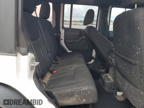 2015 Jeep Wrangler Unlimited Sport с VIN 1C4BJWDG3FL570131, выставлен на аукционе Copart как лот 64418415 с пробегом 112 362 миль миль и Списание • Salvage title. История ставок и продаж доступна на DreamBid. Изображение 11.
