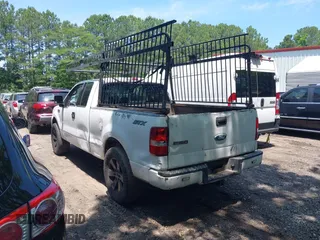 2004 Ford F-150 STX with VIN 1FTRX12W24NC08853, listed as a IAAI auction lot 42391695 with Not provided miles and . Bid and sale history available at DreamBid. Image 3.