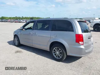 2014 Dodge Grand Caravan SXT with VIN 2C4RDGCG3ER193688, listed as a IAAI auction lot 41290544 with 73,092 mi miles and . Bid and sale history available at DreamBid. Image 3.