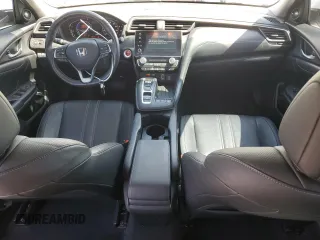 2020 Honda Insight Touring z VIN 19XZE4F9XLE012707, wystawiony jako Copart lot #56637245 z przebiegiem 69 286 mil mil oraz Szkoda całkowita • Salvage title. Historia ofert i sprzedaży dostępna na DreamBid. Obrazek 8.