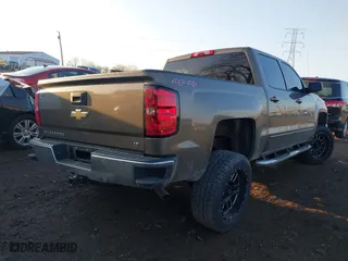 2015 Chevrolet Silverado 1500 LT with VIN 3GCUKREC8FG201619, listed as a IAAI auction lot 41853656 with 147,554 mi miles. Bid and sale history available at carsss.com. Image 4.