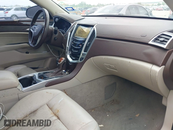 2015 Cadillac SRX Luxury Collection with VIN 3GYFNBE36FS560305, listed as a IAAI auction lot 42142934 with 160,543 mi miles and . Bid and sale history available at carsss.com. Image 5.