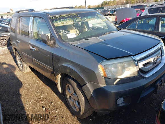 2009 Honda Pilot EX with VIN 5FNYF48489B004599, listed as a IAAI auction lot 42142115 with 999,999 mi miles. Bid and sale history available at carsss.com. Image 1.