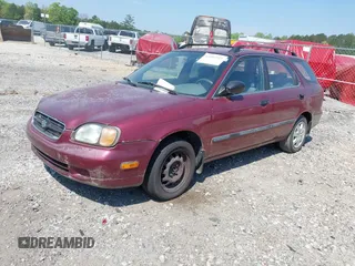 1999 Suzuki Esteem GL with VIN JS2GB41W4X5160663, listed as a IAAI auction lot 42056553 with 91,057 mi miles and . Bid and sale history available at DreamBid. Image 2.