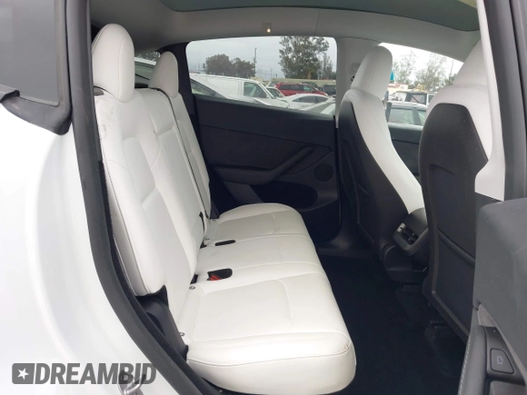 2024 Tesla Model Y with VIN 7SAYGDED4RF055859, listed as a IAAI auction lot 42201099 with 17,373 mi miles and . Bid and sale history available at DreamBid. Image 8.